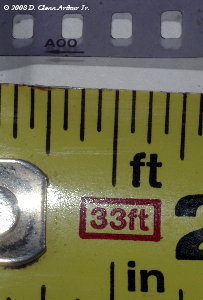[photo showing scale of 35mmfilm sprocket holes]