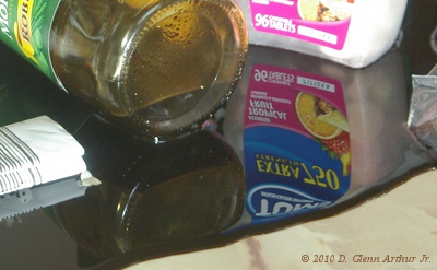 shiny black surface with stuff on it