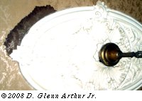 the wet spot by the 19th C. ornamental thingie